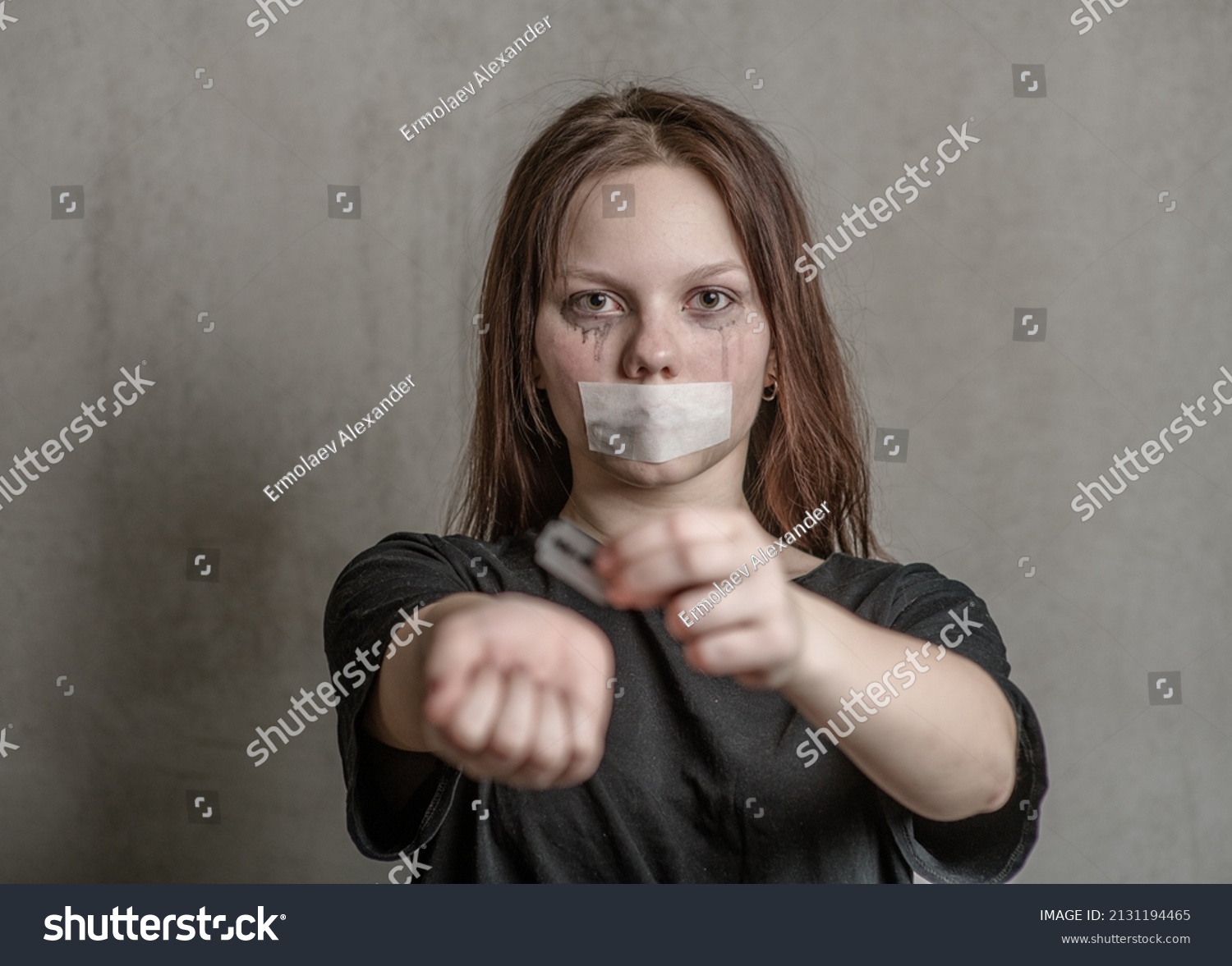 Teen Girl Trying Cut Her Veins Stock Photo (Edit Now) 2131194465