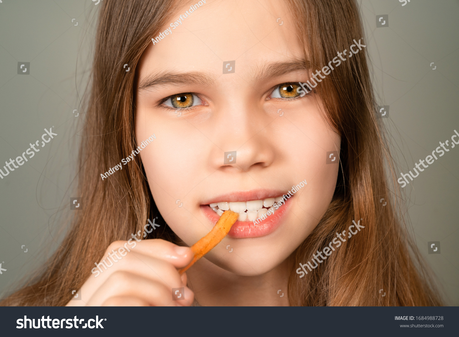 teenage-girl-eating-french-fries-closeup-stock-photo-edit-now-1684988728