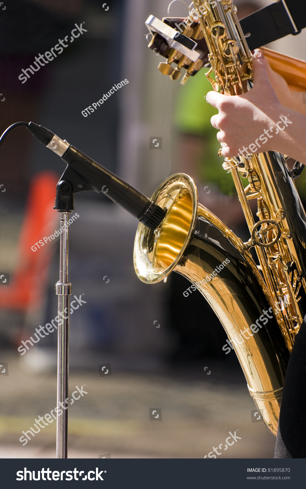 Tenor Sax Musician Holding The Instrument At The Microphone Stock Photo ...