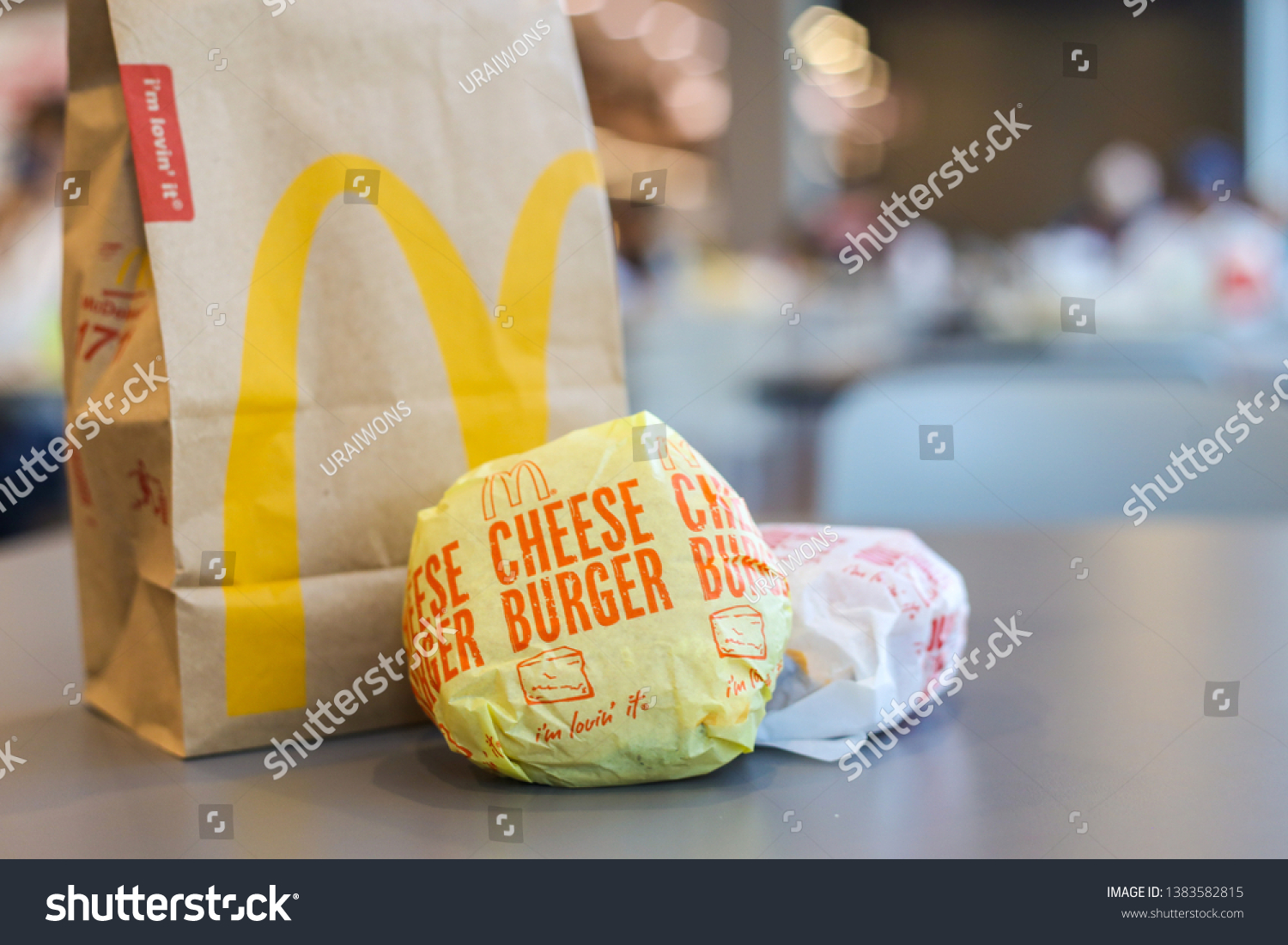 Download Thailandapril2019 Cheeseburger Yellow Paper Wrap Take Stock Photo Edit Now 1383582815 Yellowimages Mockups