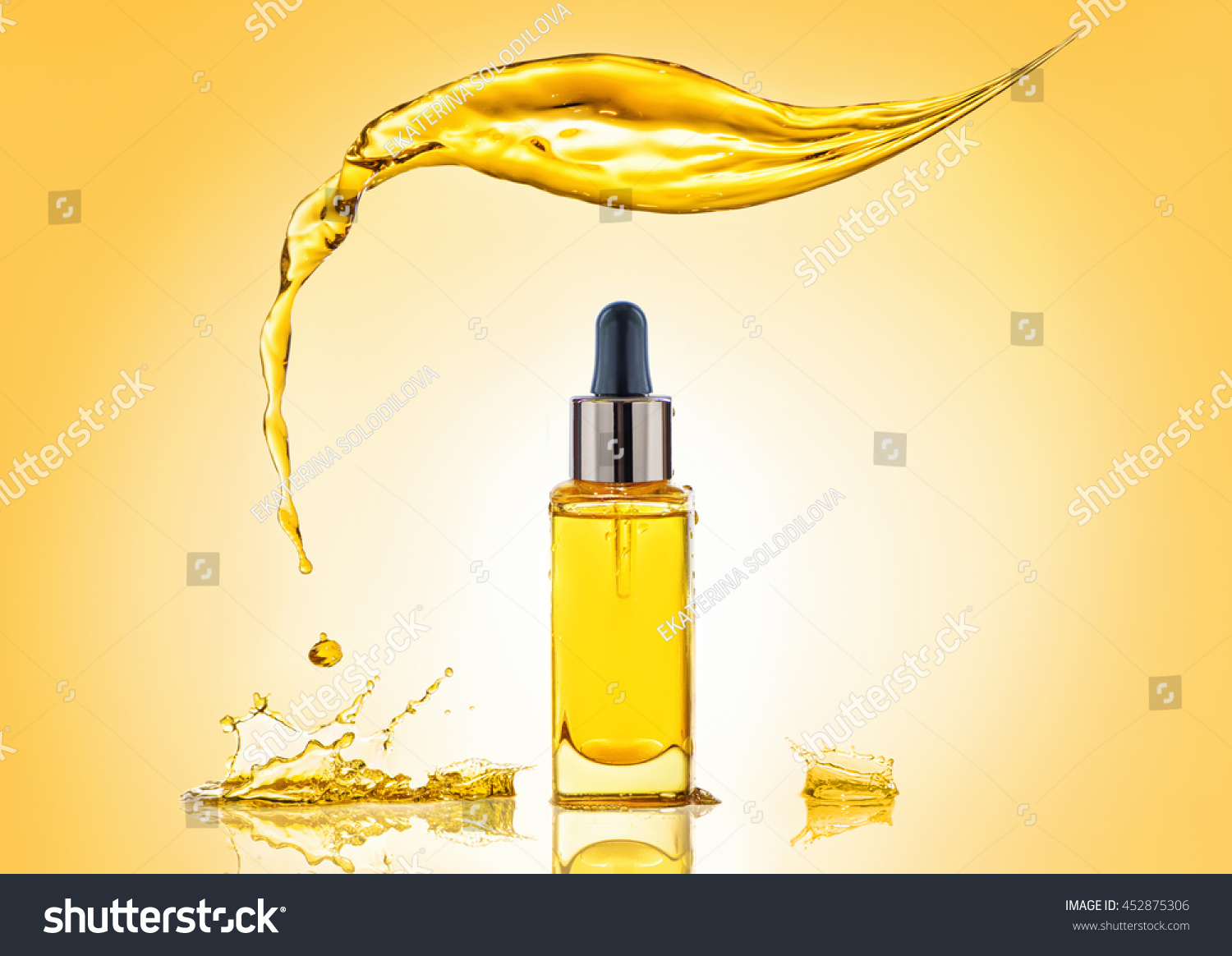 Download Bottle Yellow Cosmetic Oil Big Splash Beauty Fashion Stock Image 452875306 Yellowimages Mockups