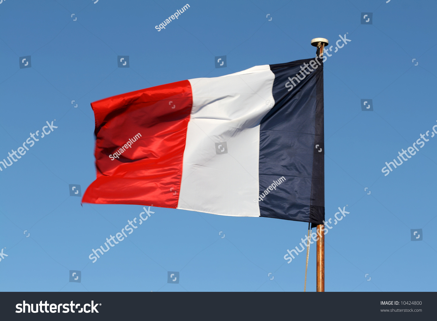 The French Tricolour Flapping In The Wind On A Flagpole. Stock Photo ...