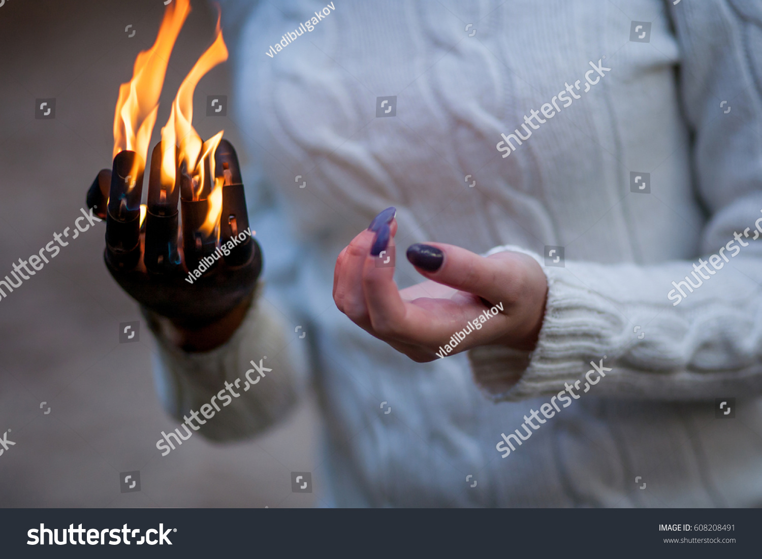 Girls Hand Against Fire Gesture Support の写真素材 今すぐ編集