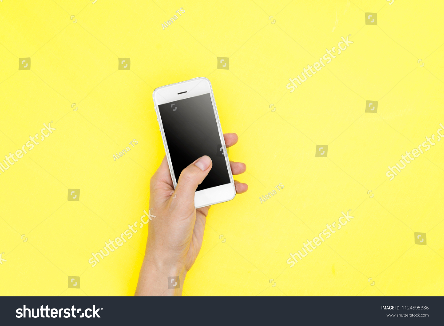 hand-holds-smartphone-black-screen-on-1124595386-shutterstock