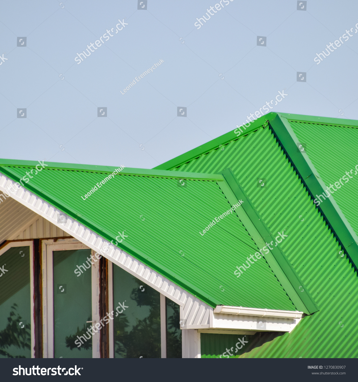 House Plastic Windows Green Roof Corrugated Stock Photo