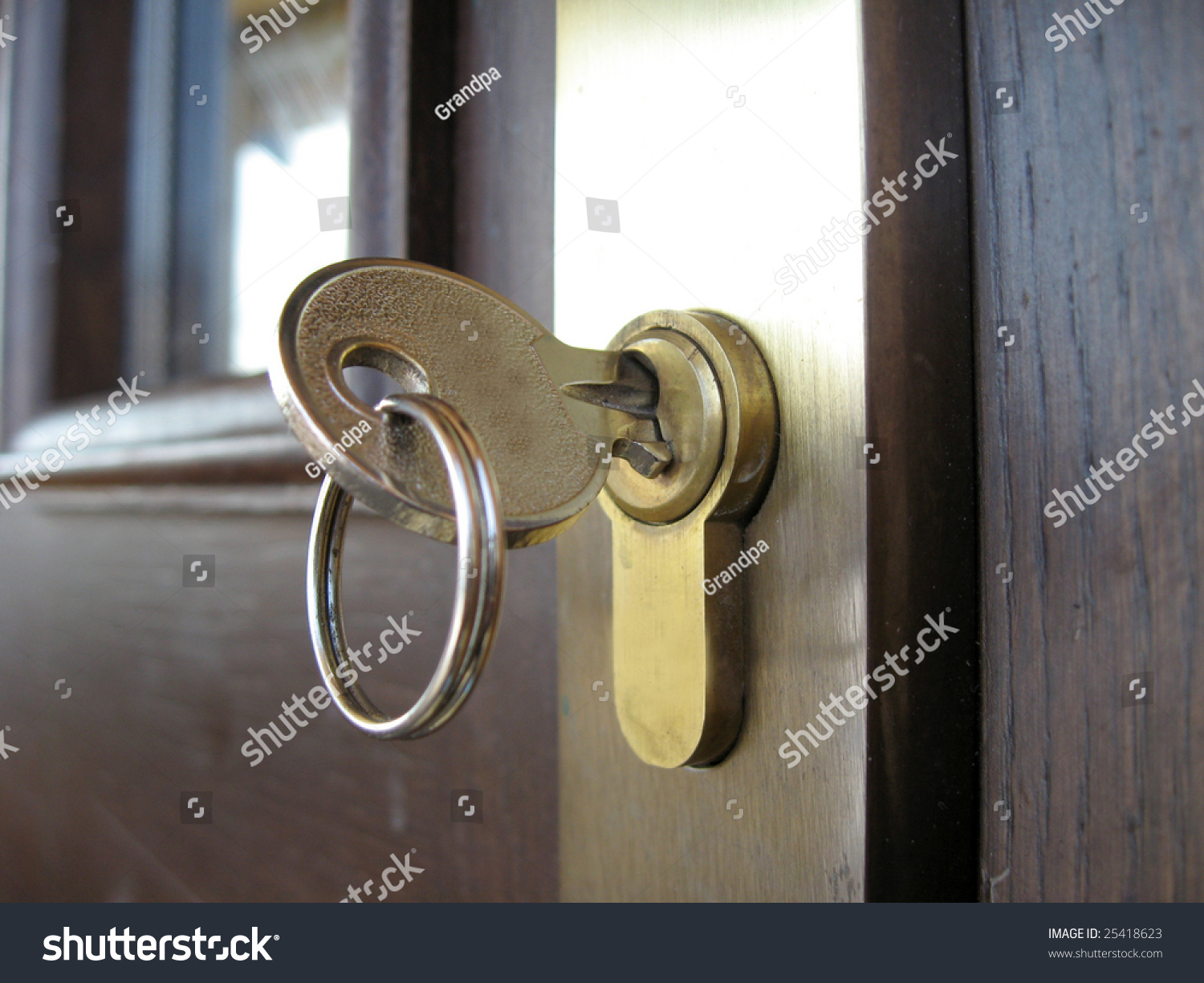 The Key In The Door Lock, Close Up Stock Photo 25418623 : Shutterstock