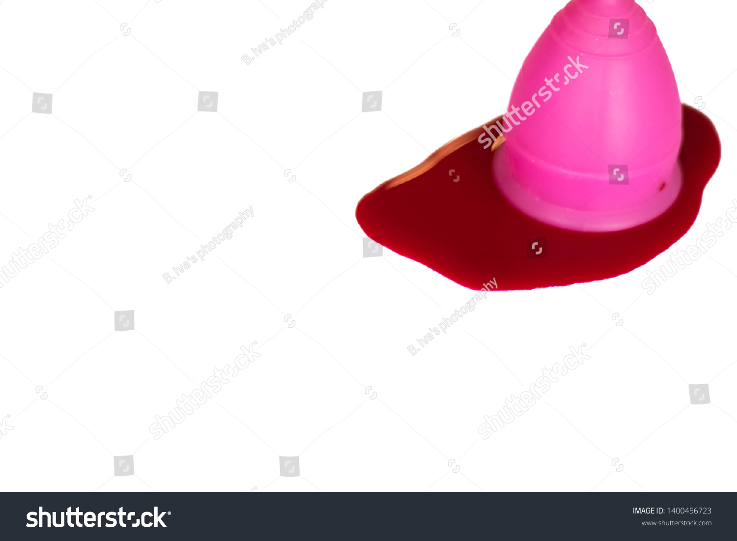 lunette-menstrual-cup-filled-spilled-fake-stock-photo-edit-now-1400456723