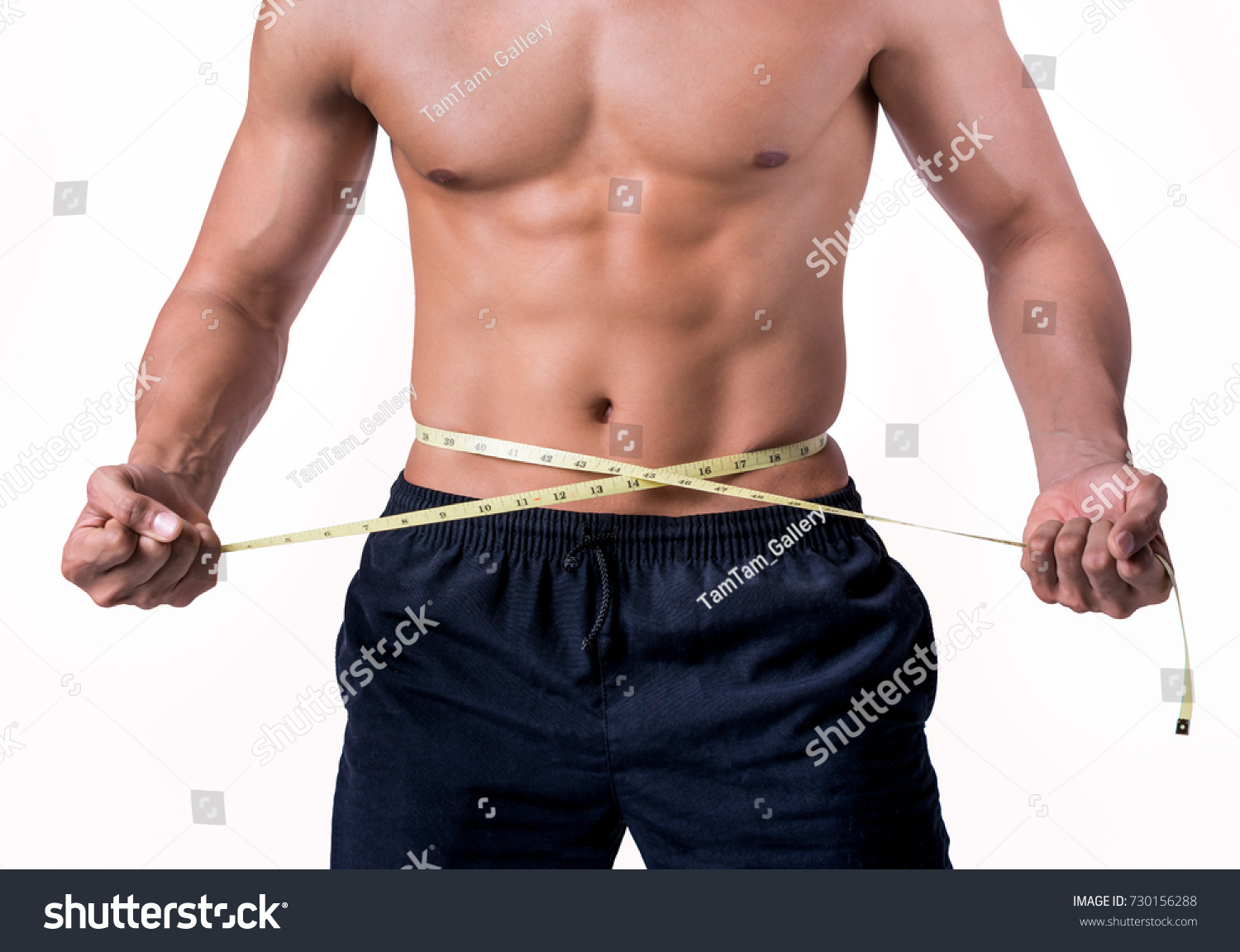 Man Showing Muscular Body Six Pack Stock Photo Edit Now