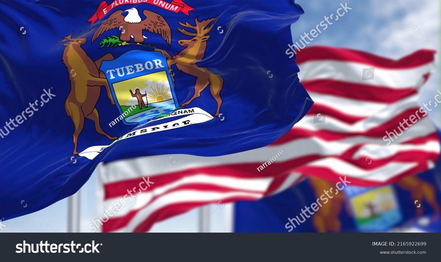 5 962 Michigan Flag Images Stock Photos Vectors Shutterstock Stock Photo The Michigan State Flag Waving Along With The National Flag Of The United States Of America In The 2165922699