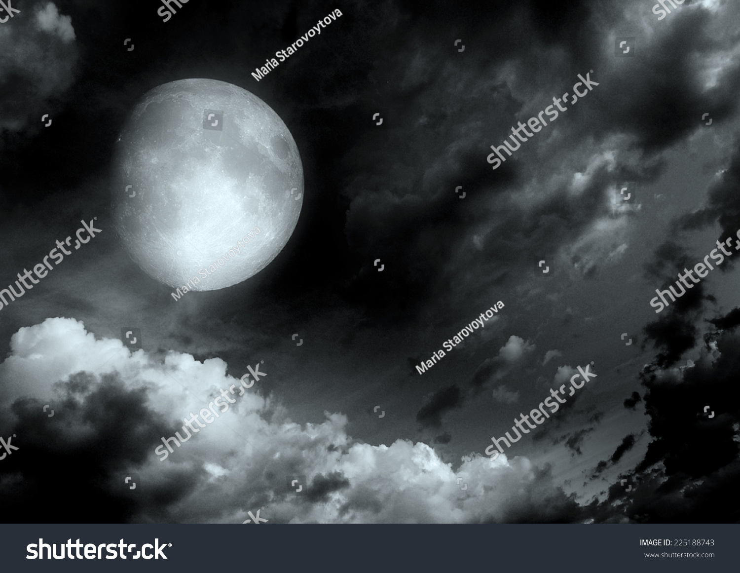 The Moon In The Night Sky In Clouds 