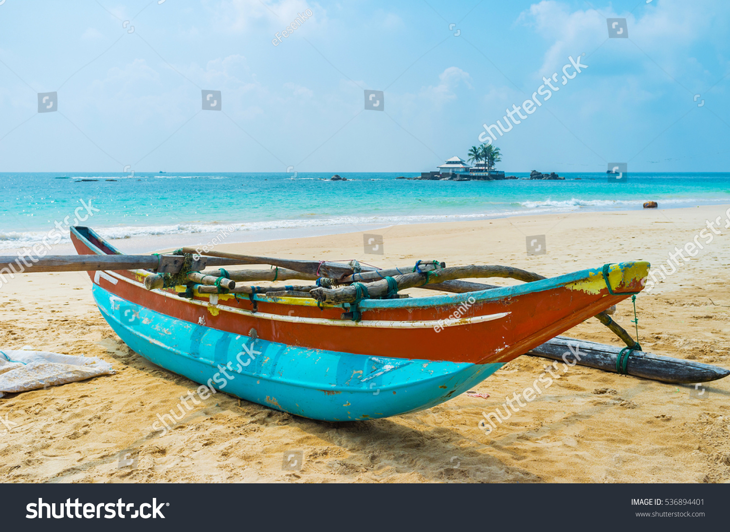 old catamaran boat on beach next stock photo 536894401