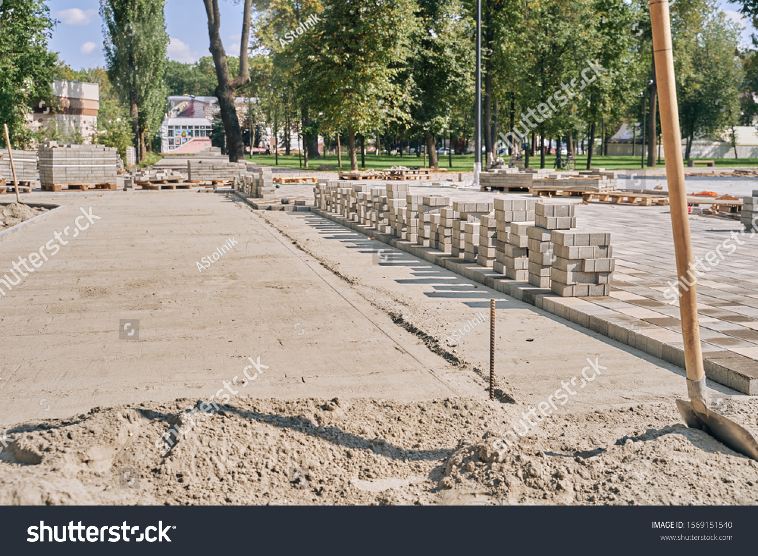 laying paving slabs on sand base