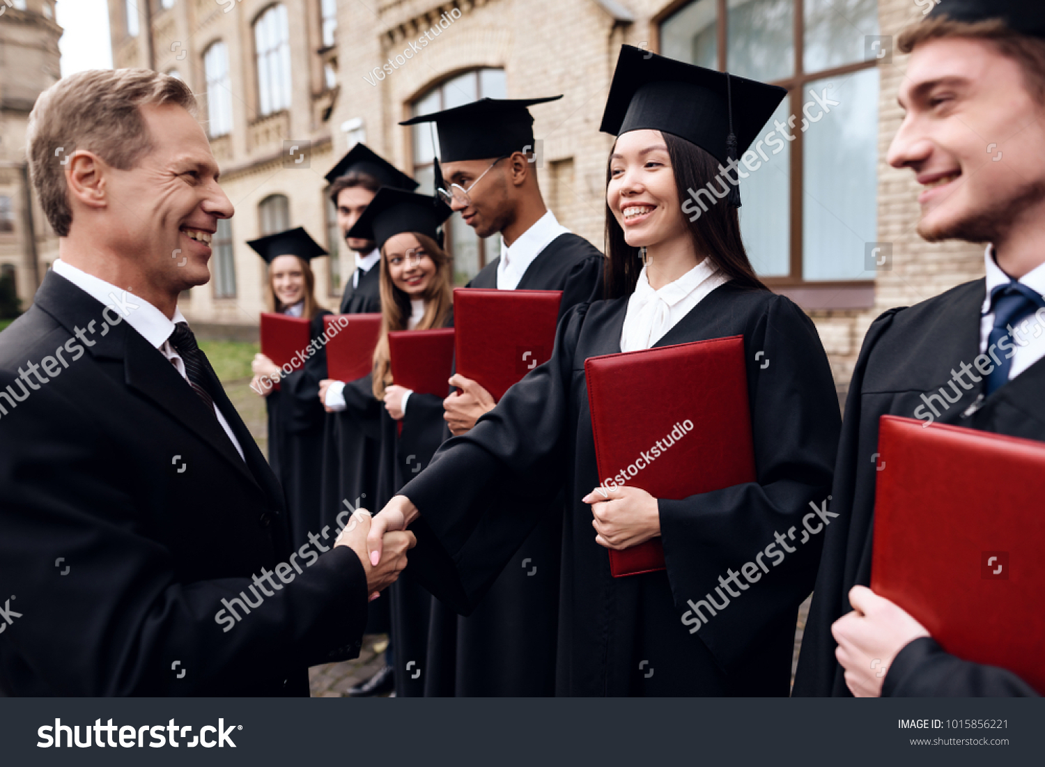 69 Senior graduating shaking hand Images, Stock Photos & Vectors ...