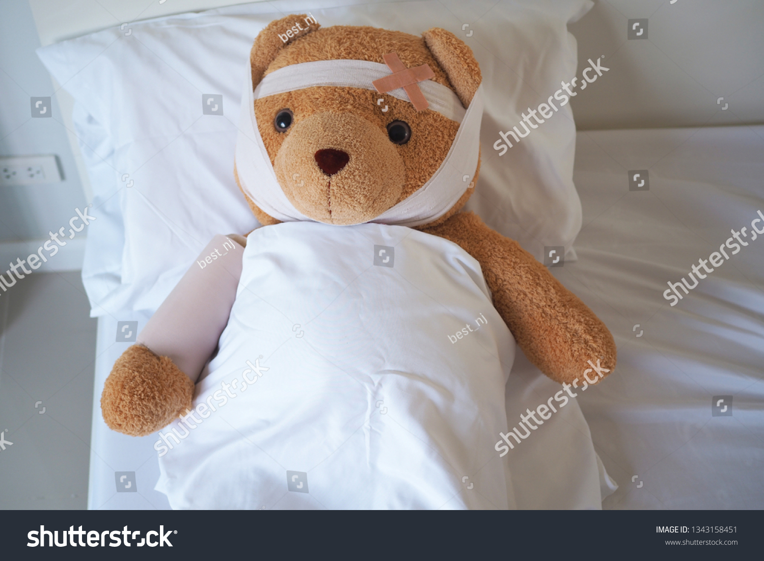 broken arm teddy bear