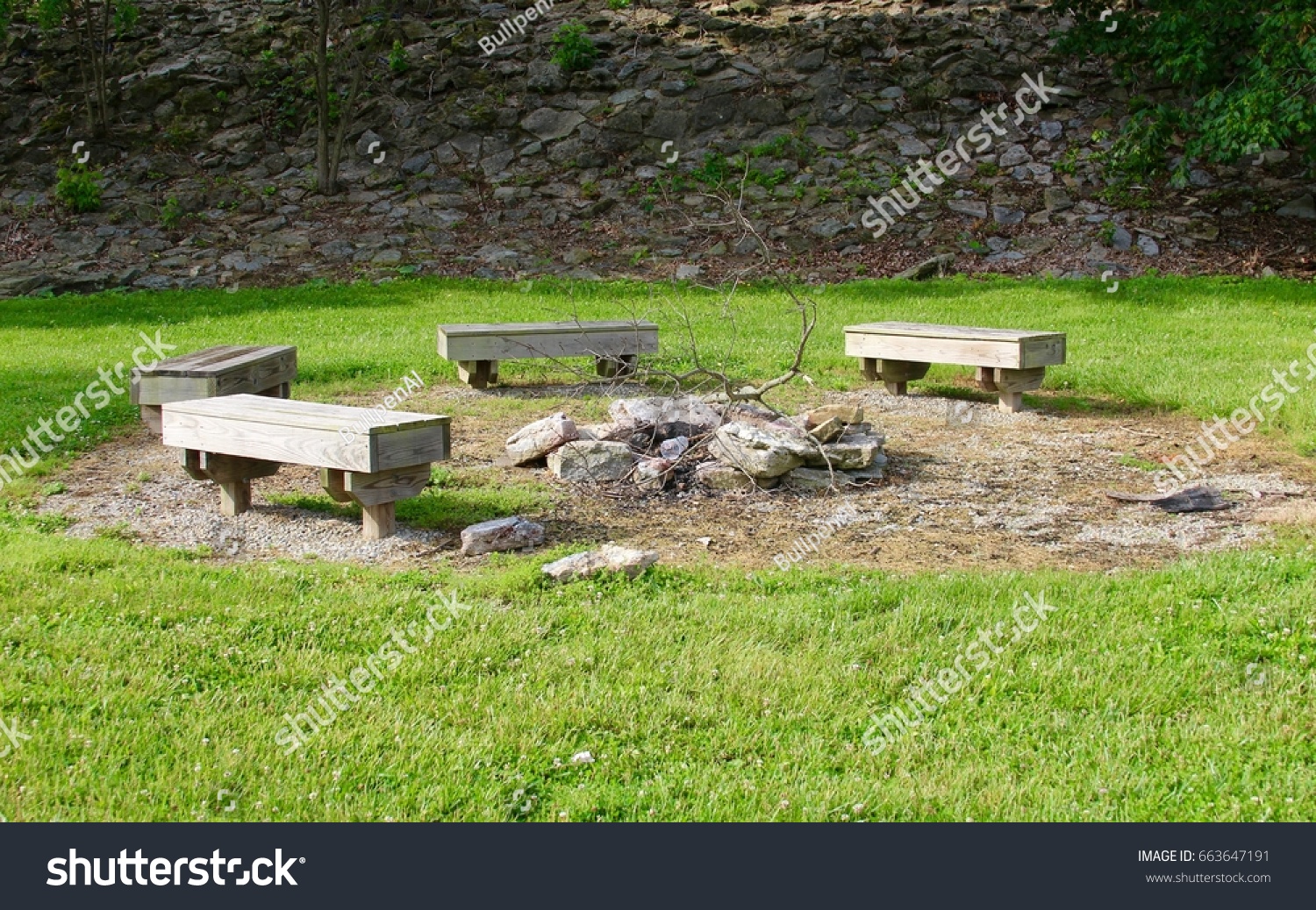 Wood Benches Around Stone Rock Fire Stock Photo Edit Now 663647191