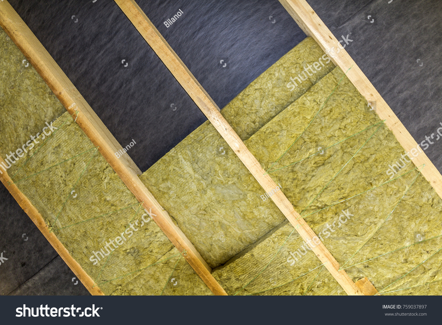 Thermal Insulation Mineral Rock Wool Installation Stock Photo