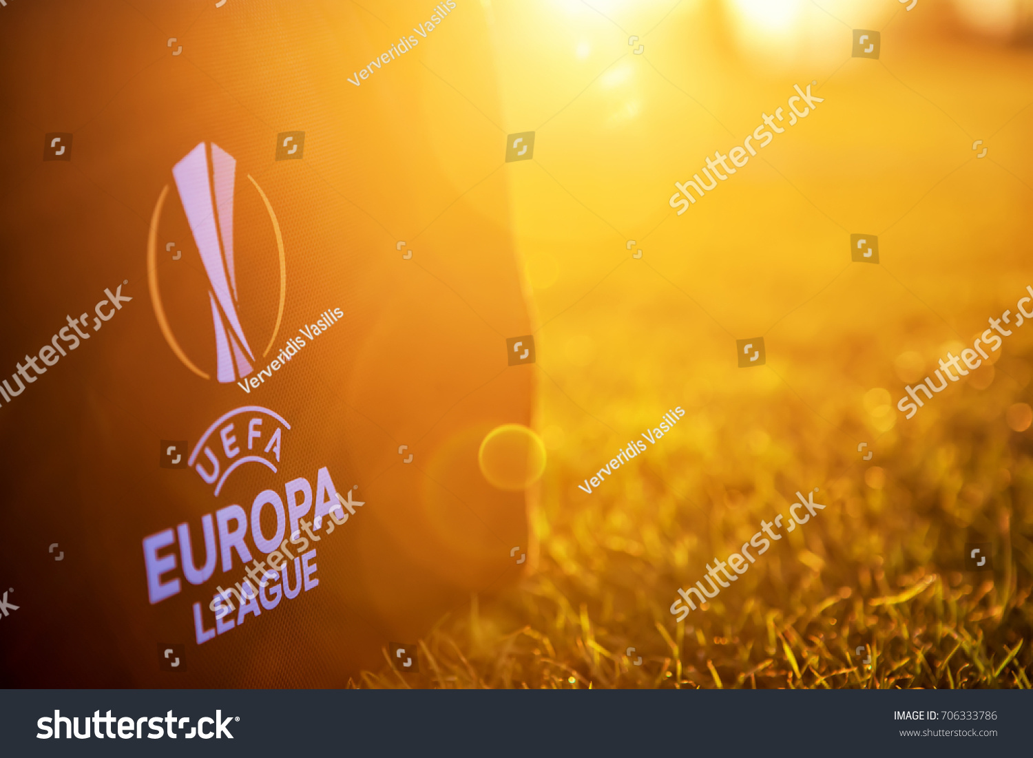 Thessaloniki, Greece- August 2, 2017: UEFA Europa League Logo on the bag on the pitch in the sunset 