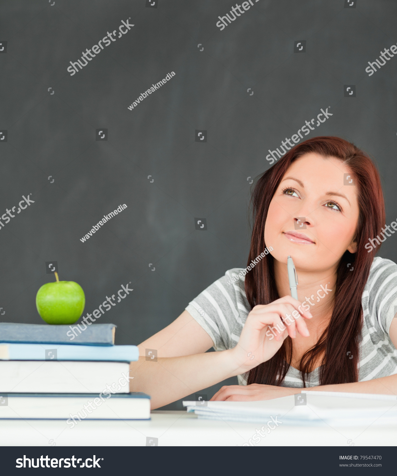 Reflective Essay On English Class Thoughtful Student Writing An Essay In A Classroom Fifth Business Essay also How To Write Science Essay Thoughtful Student Writing Essay Classroom Stock Photo Edit Now Model English Essays