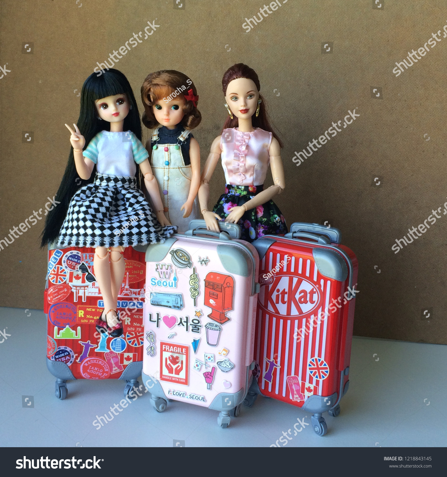 three beautiful dolls