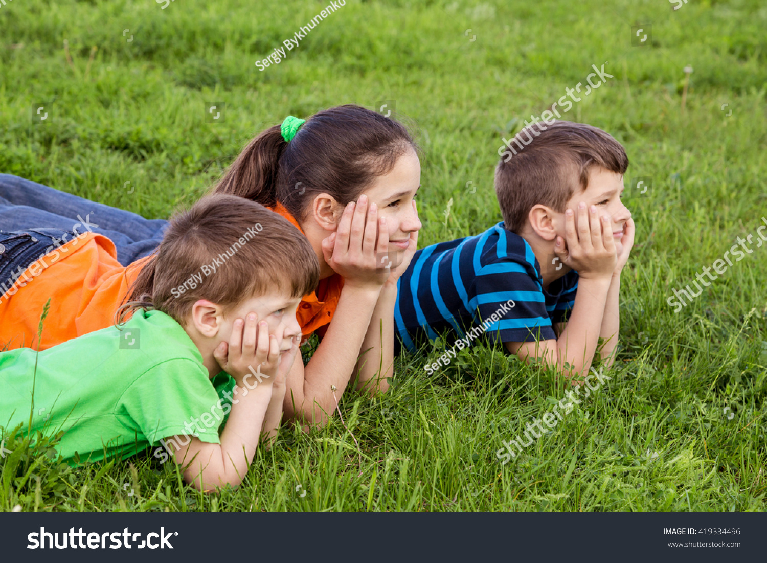 Three Smiling Kids Lying Together On Stock Photo 419334496 - Shutterstock