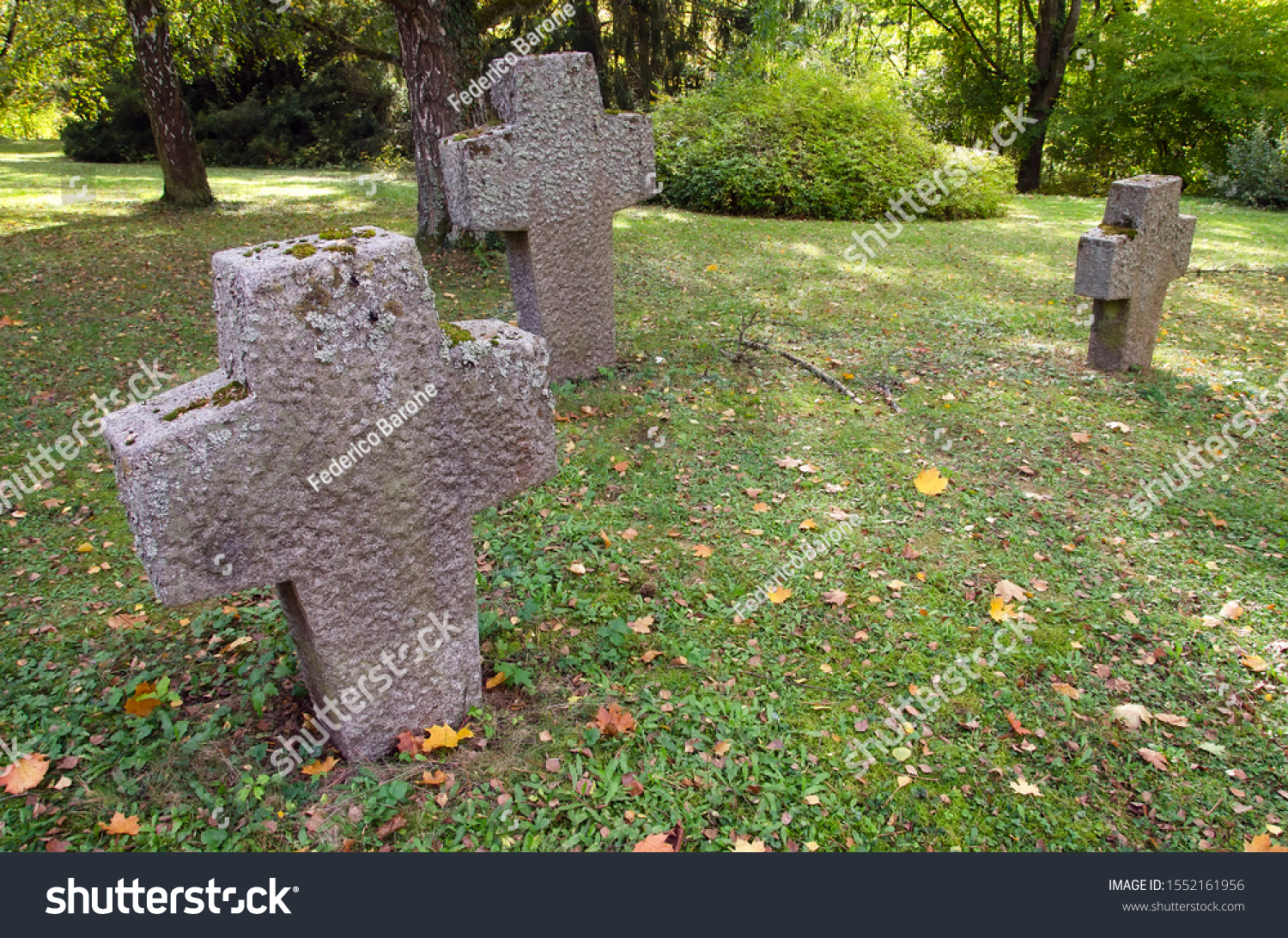 stock-photo-three-stone-crosses-in-an-ol