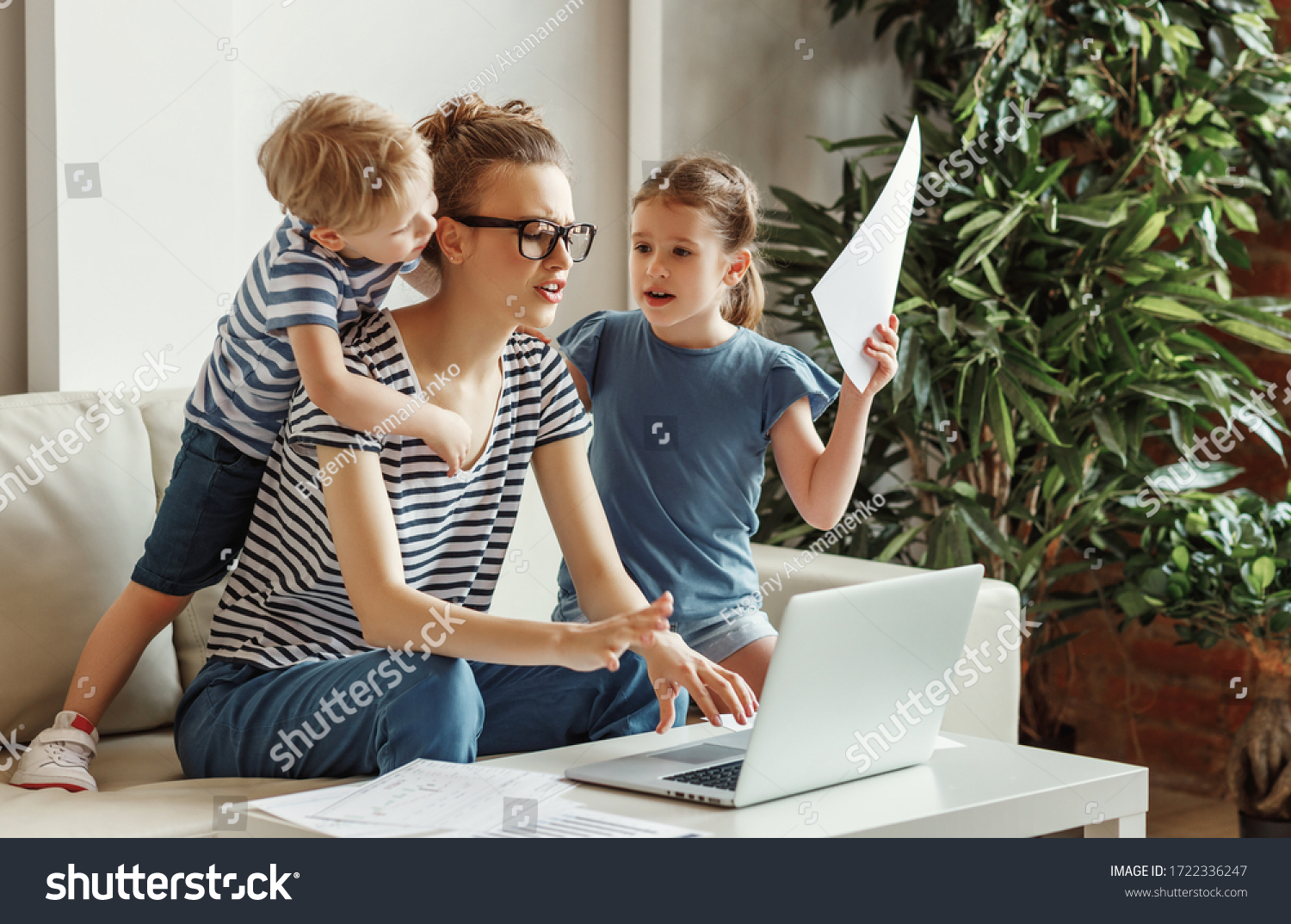 Tired Young Mother Sitting On Sofa Stock Photo 1722336247 | Shutterstock