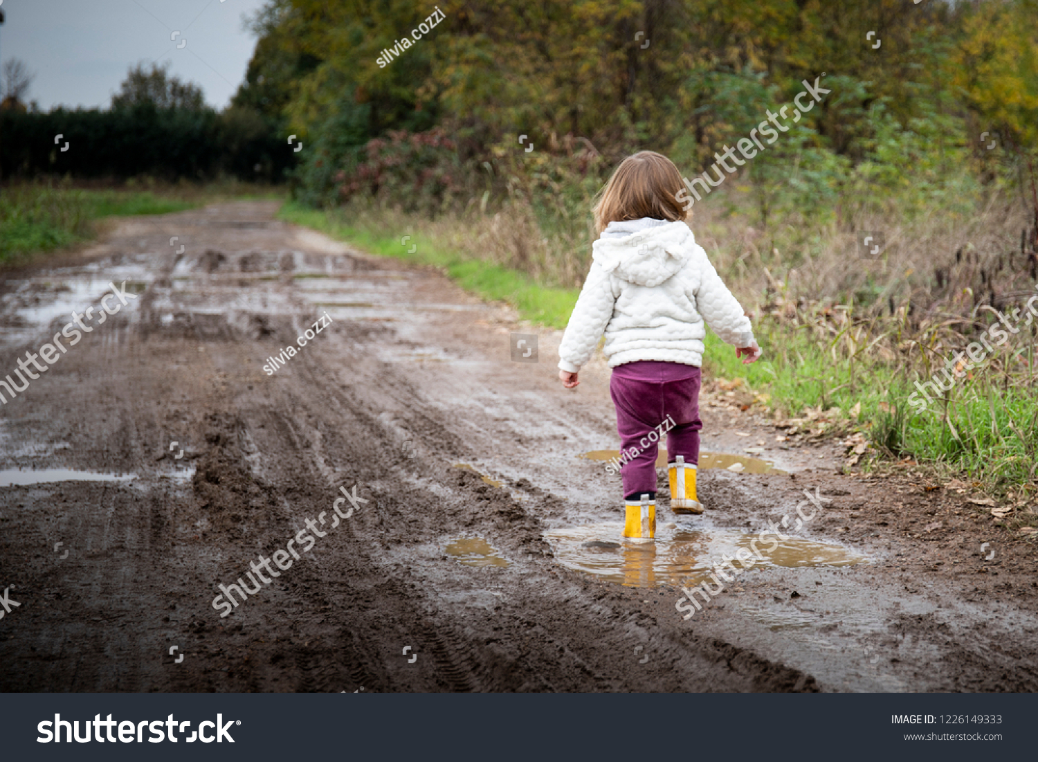 View Splashing Puddles Stock Photo 