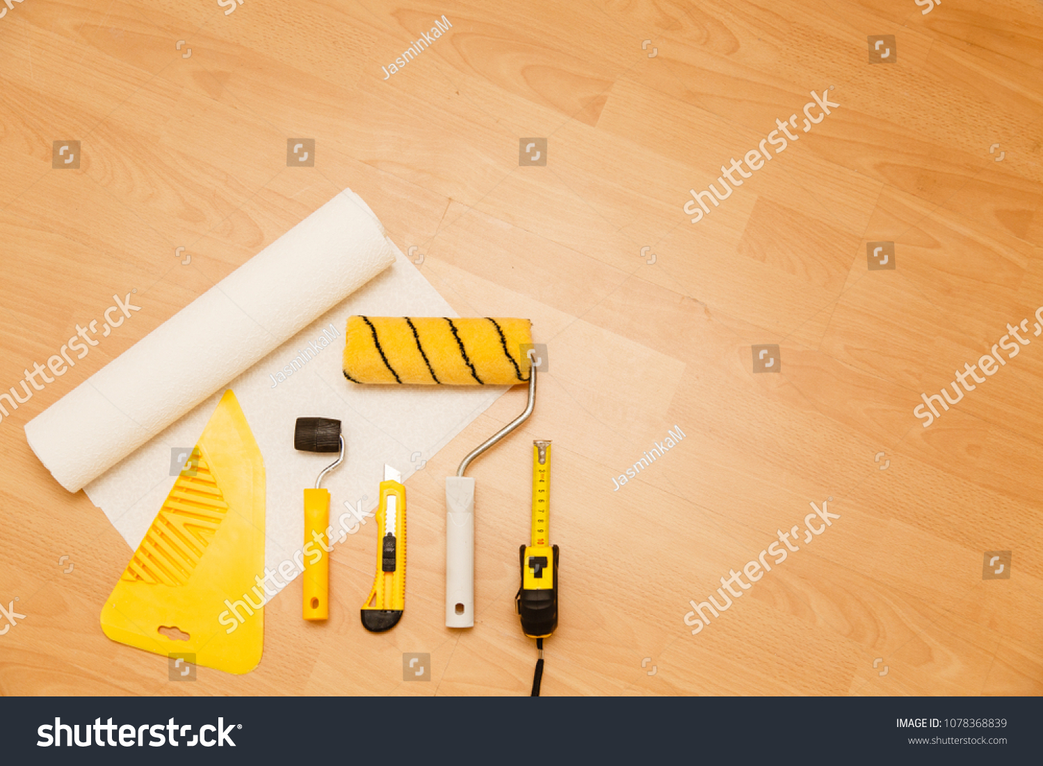 Tools Gluing Wallpapers On Laminate Floor Stock Photo Edit