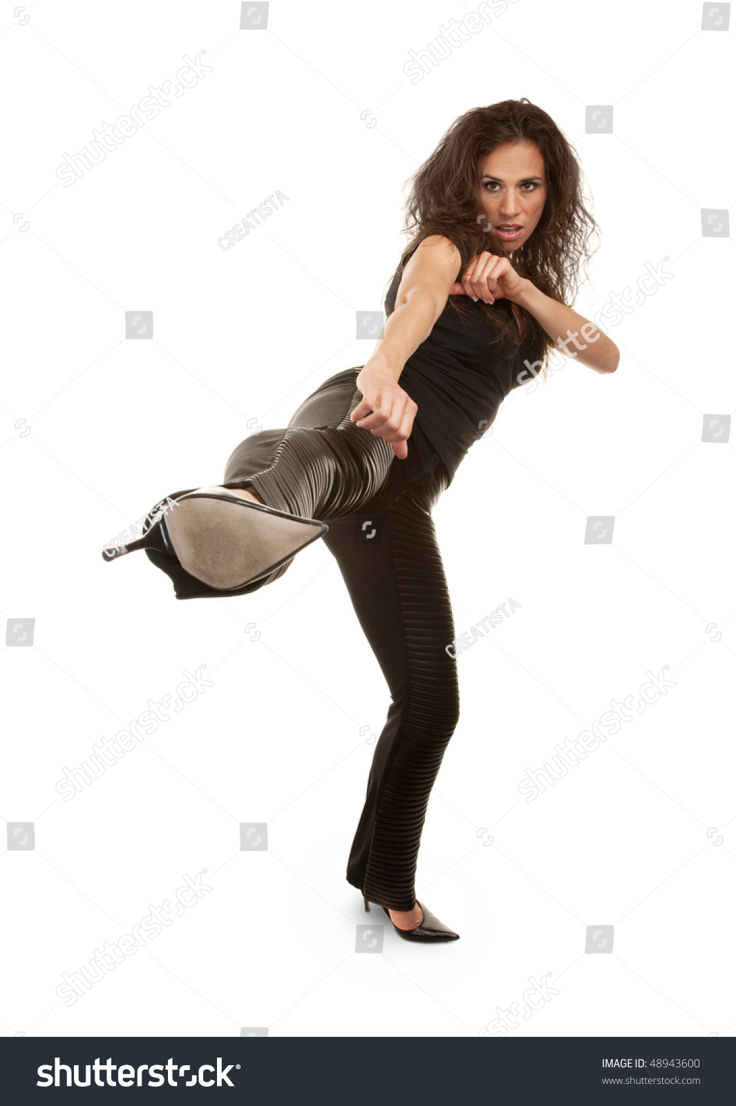 Tough Woman In High Heels Kicking At Camera Stock Photo 48943600 ...