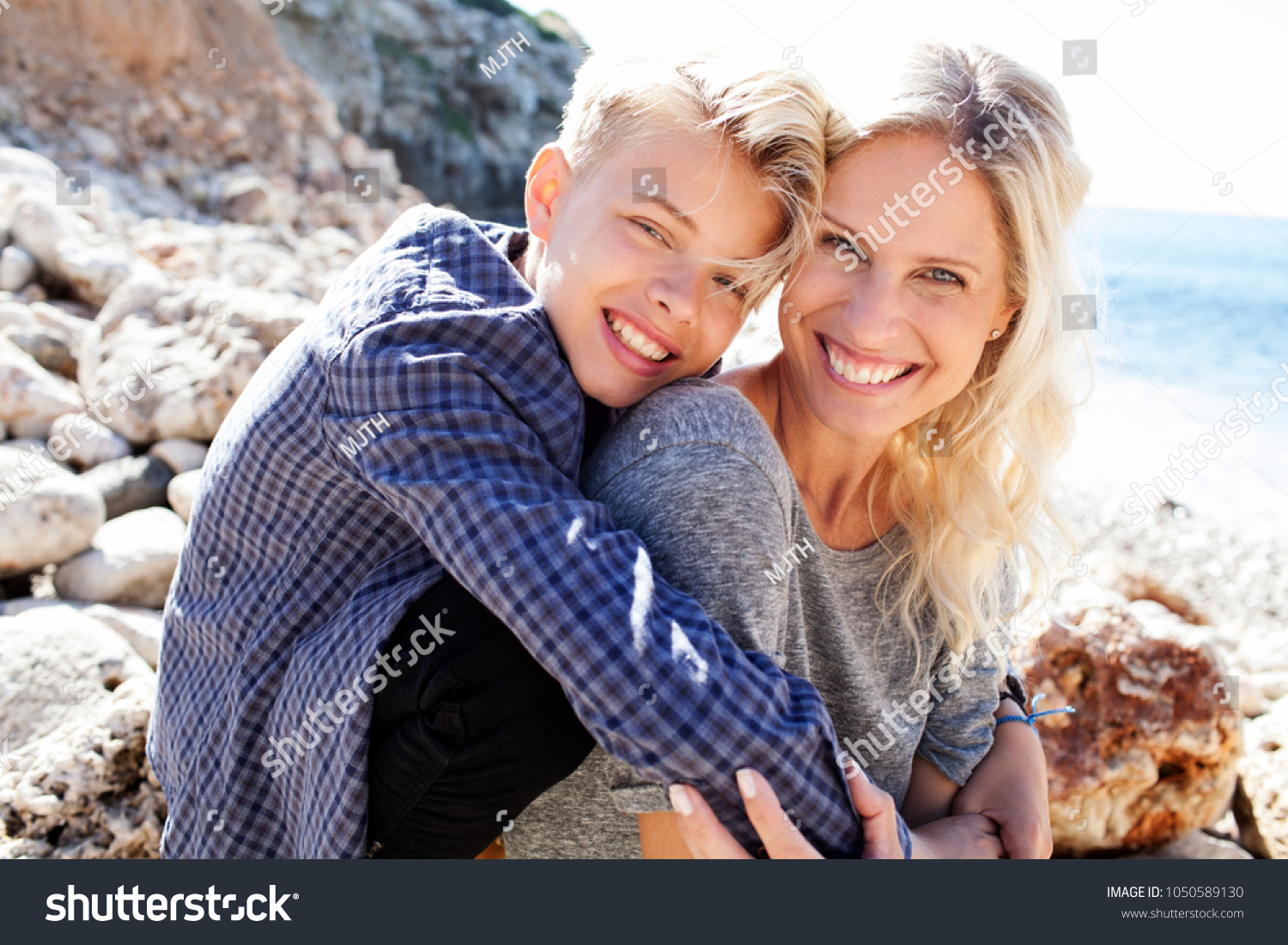 Tourist Mother Son On Beach Holiday Stock Photo Edit Now 1050589130