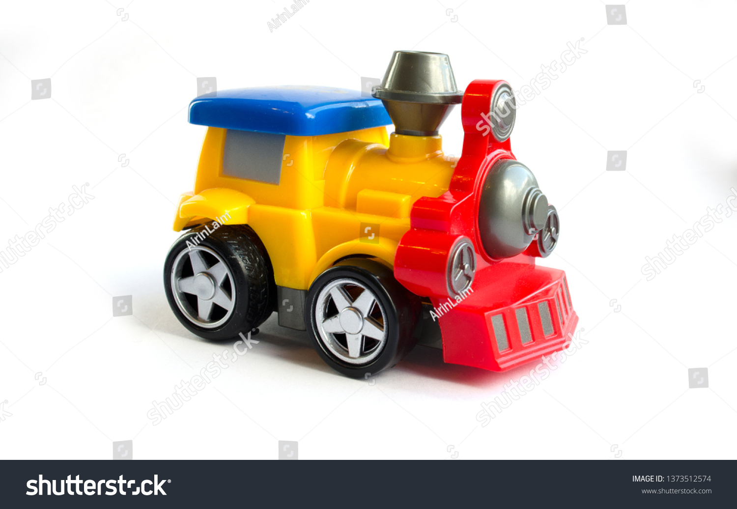 red plastic car with yellow roof