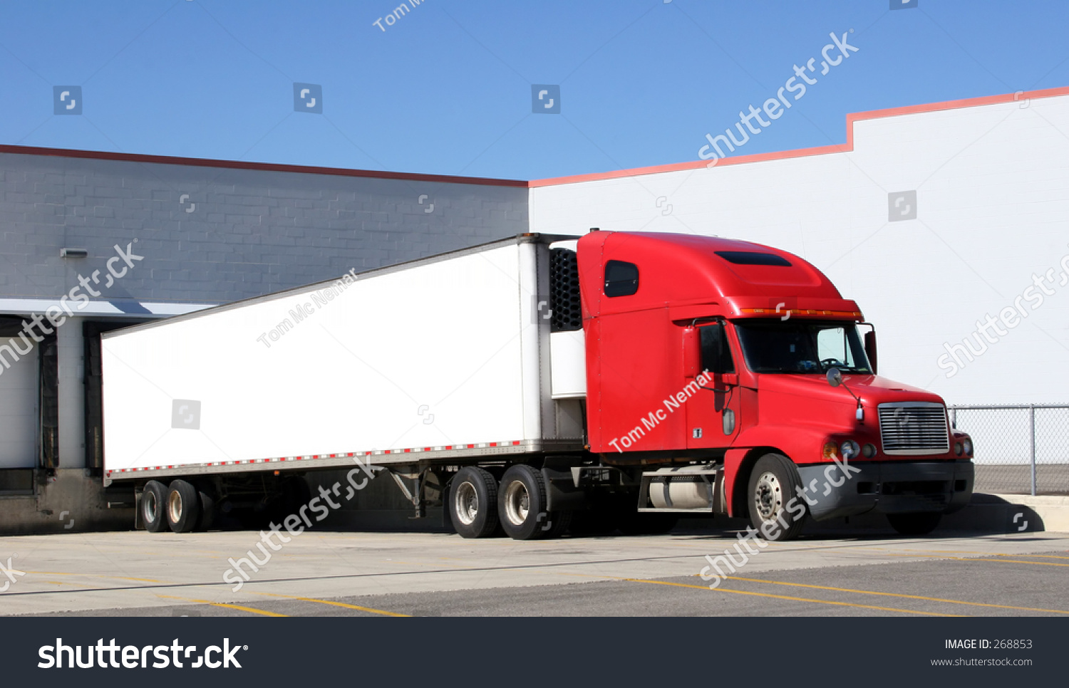 Tractor Trailer Sitting At A Loading Dock. Space For Text On The ...