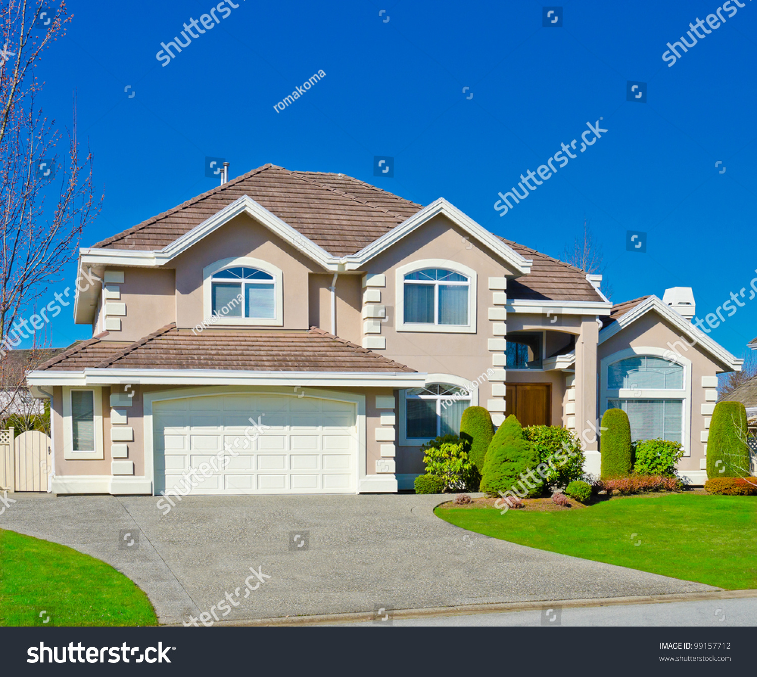 Traditional American Home Double Doors Garage Stock Traditional American Home Double Doors Garage Stock