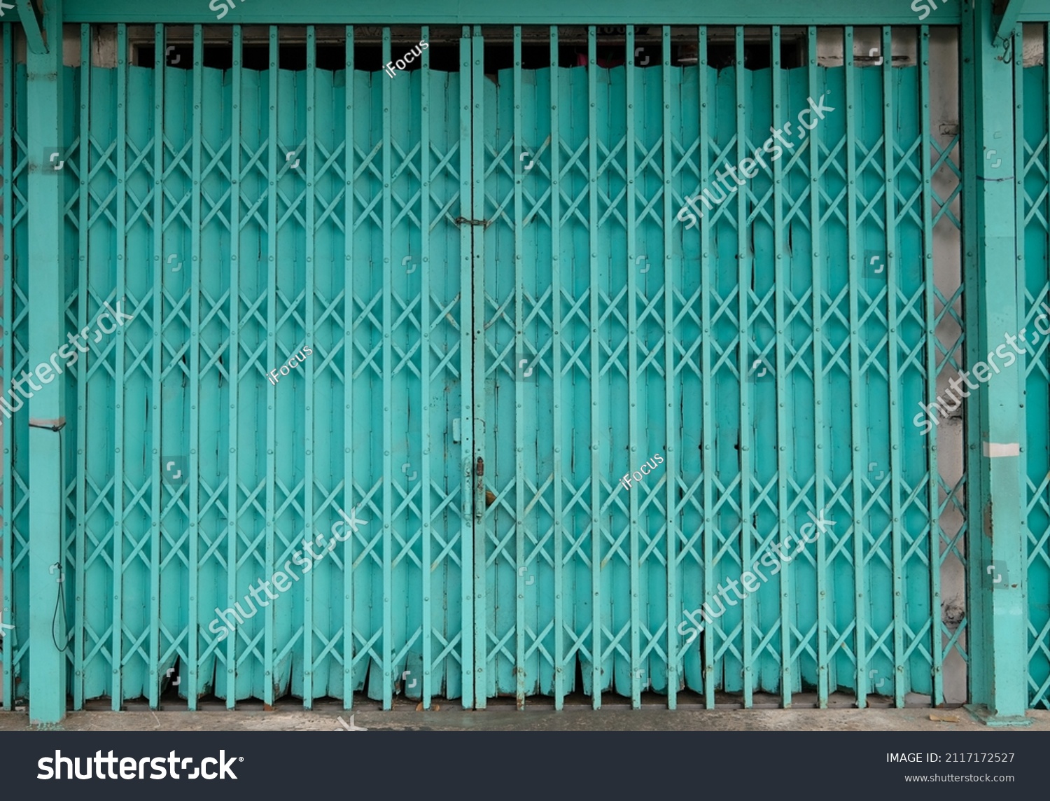 Stock Photo Traditional Folding Geen Metal Door Gate 2117172527 