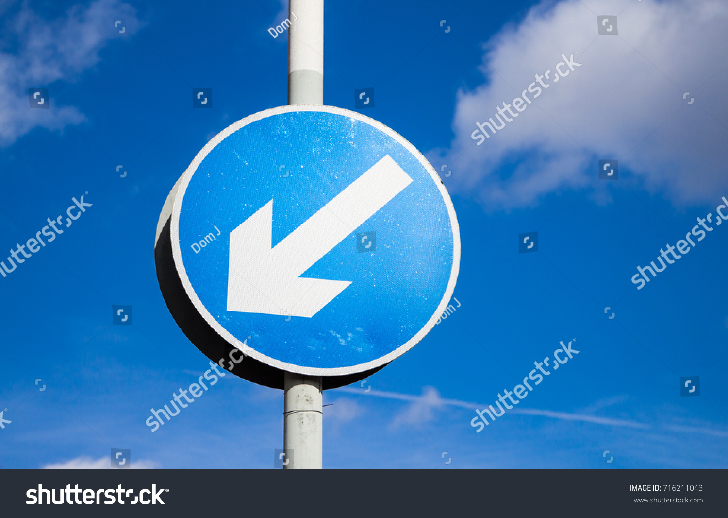 Traffic Sign Blue Arrow Pointing Down Stock Photo Edit Now