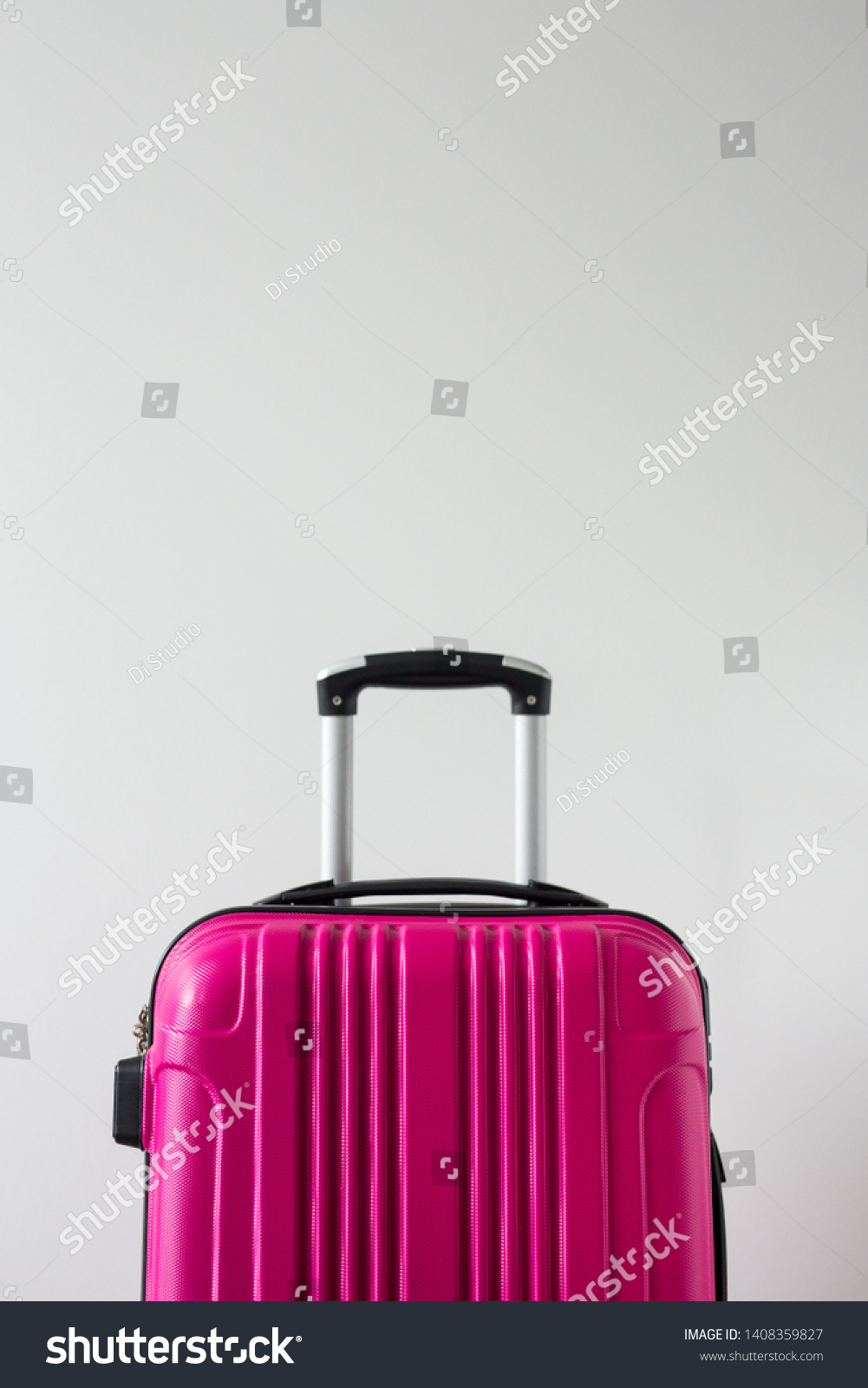 pink plastic suitcase