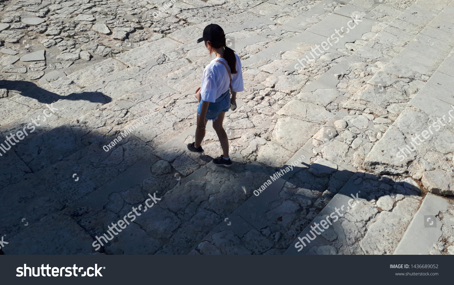 Children's shadow on a street in Crete