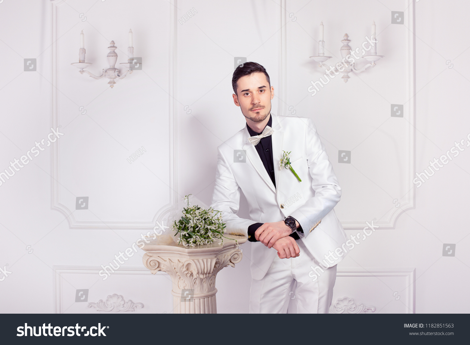 white suit with black shoes