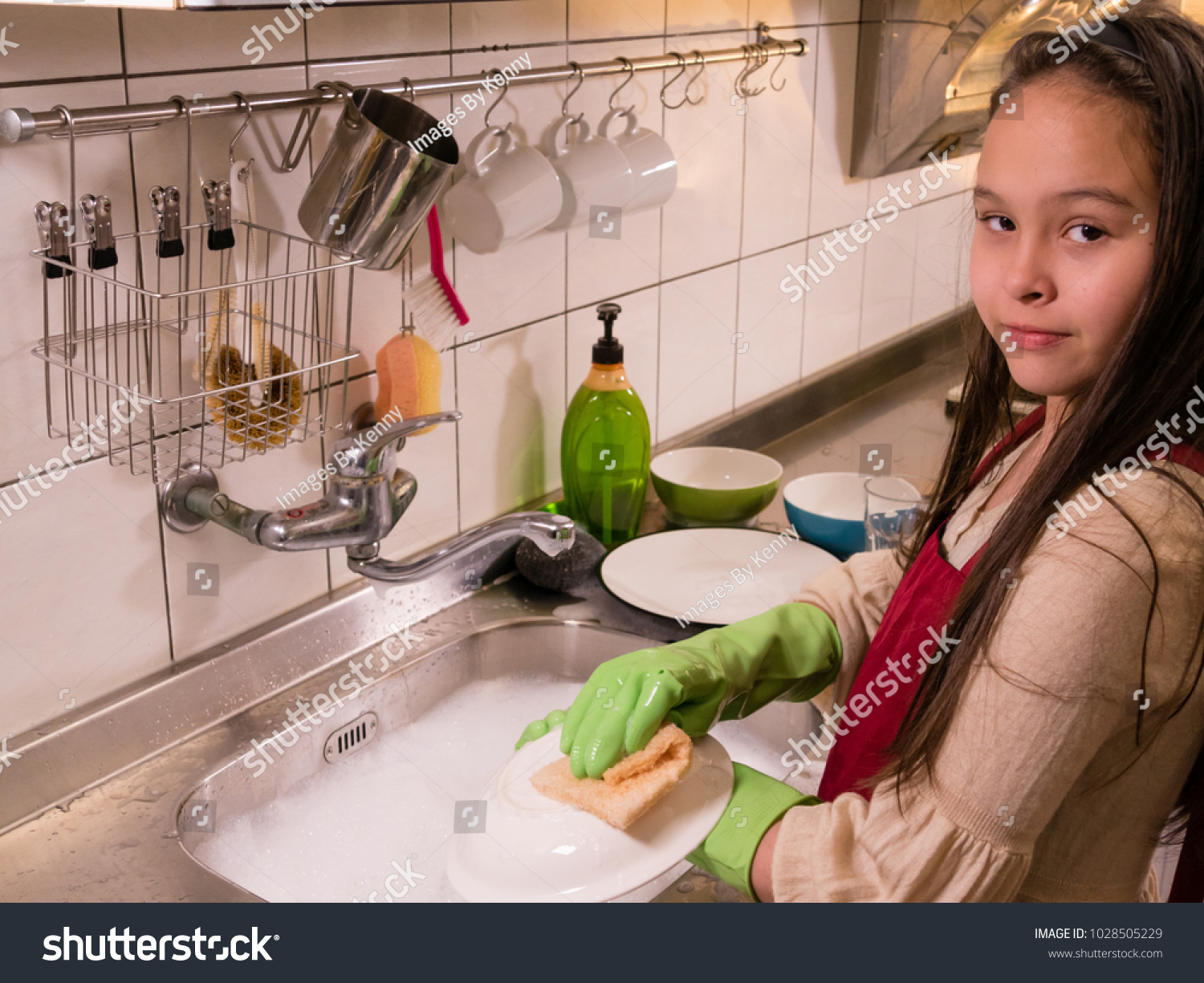 Tween Asian American Girl Washing Dishes Stock Photo 1028505229 ...