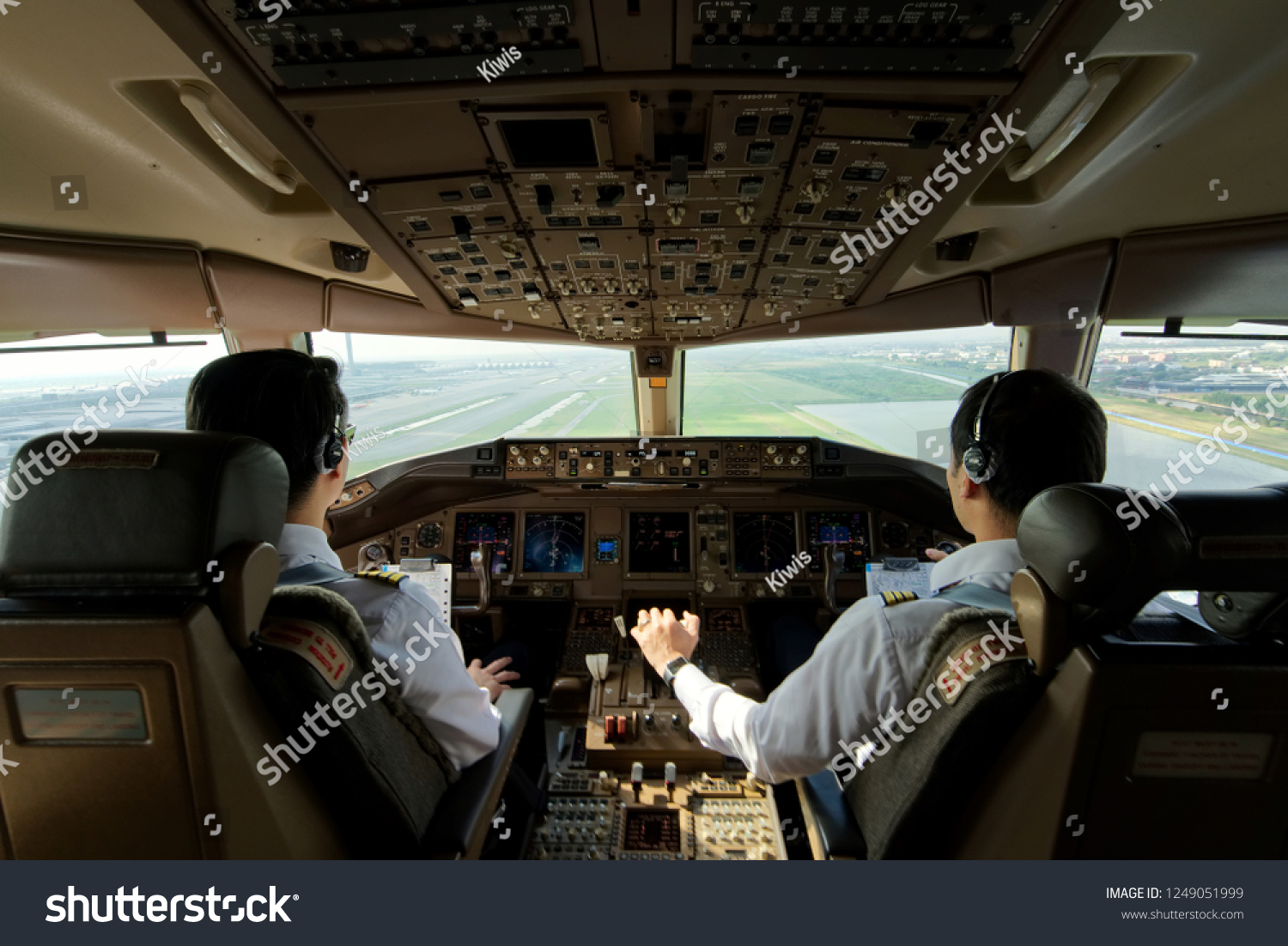 Two Airliner Pilots Flying Airplane Towards Stock Photo 1249051999