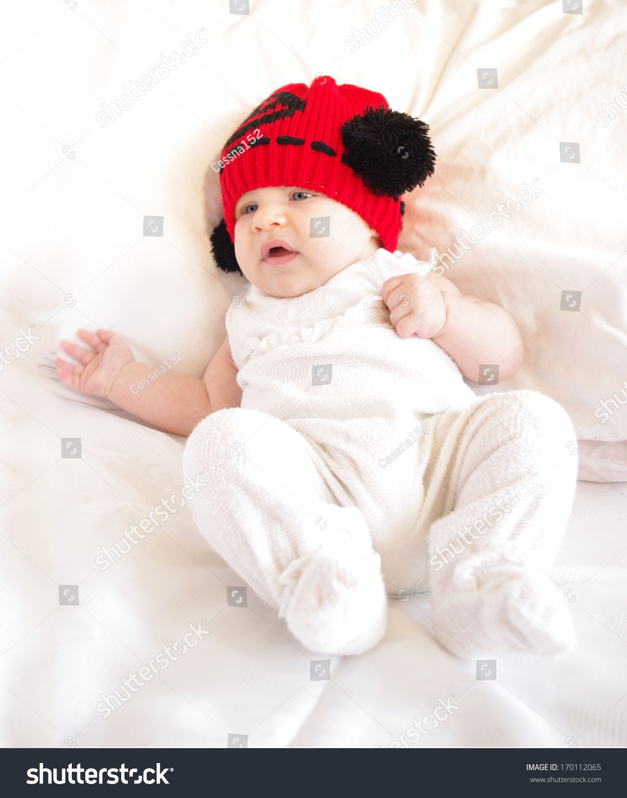 baby red bobble hat