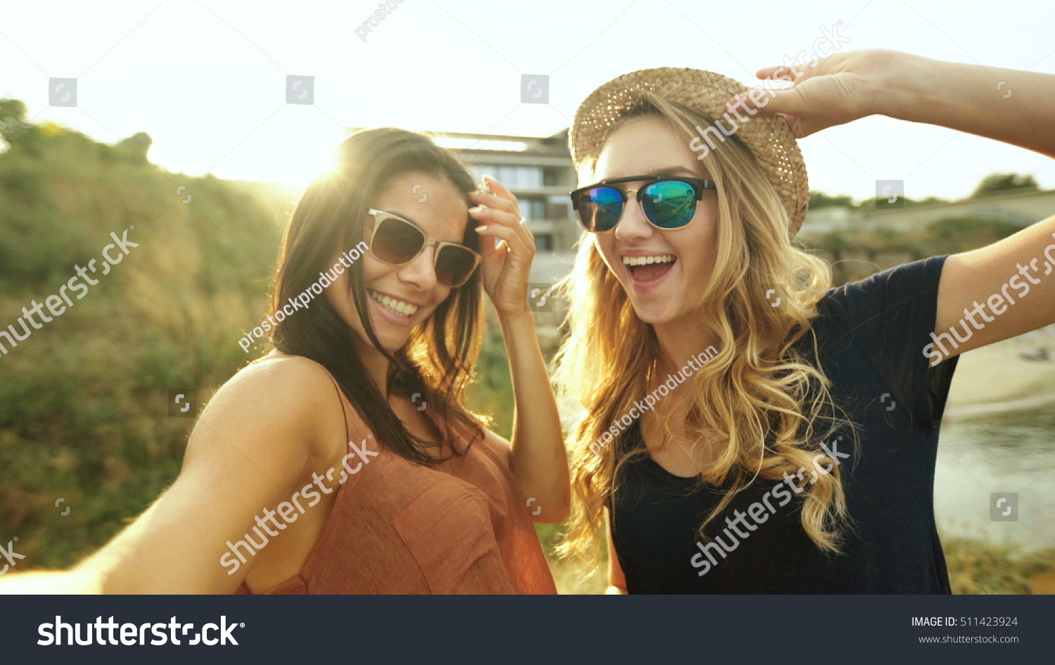 Two Beautiful Girls Taking Selfies. Stock Photo 511423924 : Shutterstock