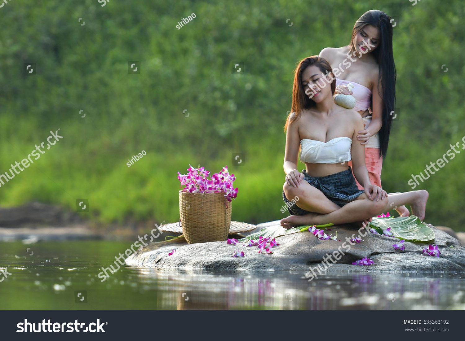 Two Beauties Giving Nice Massage to Each Other