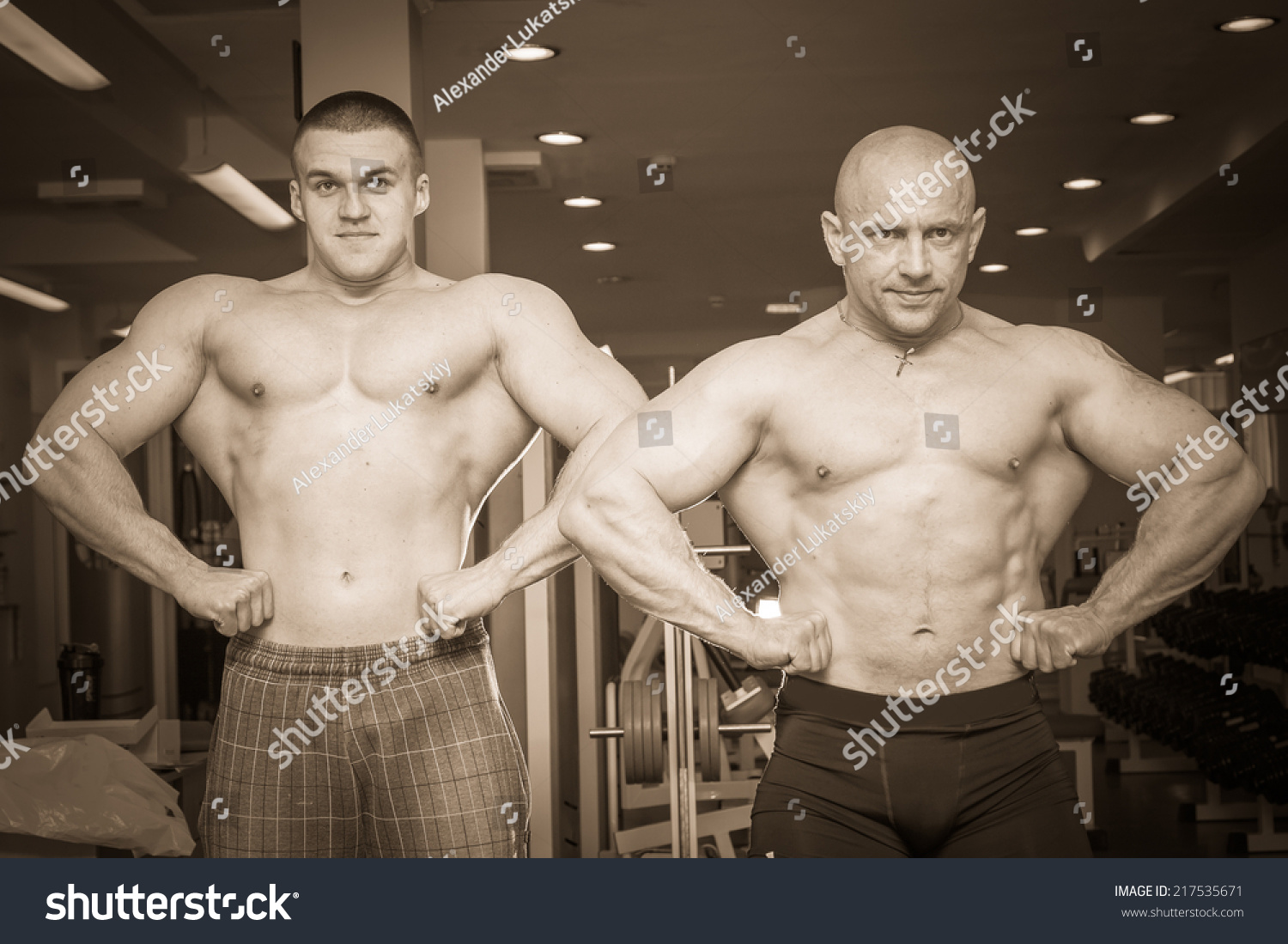 Two Bodybuilders Posing Gym Stock Photo Edit Now 217535671