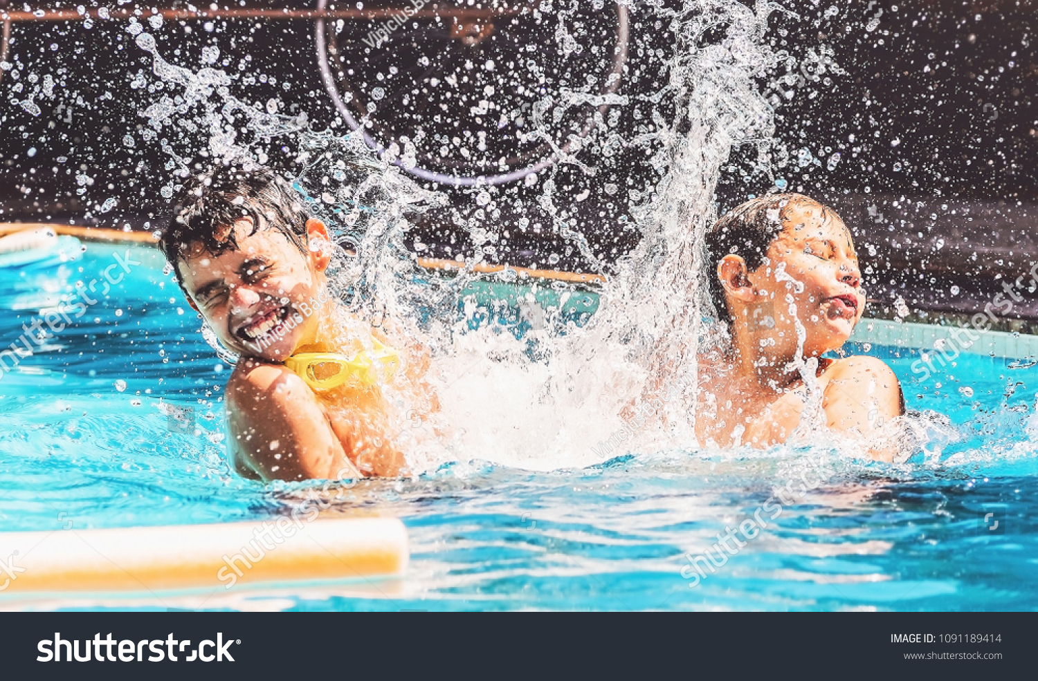 Two Boys Swimming Pool Splashing Water Stock Photo 1091189414