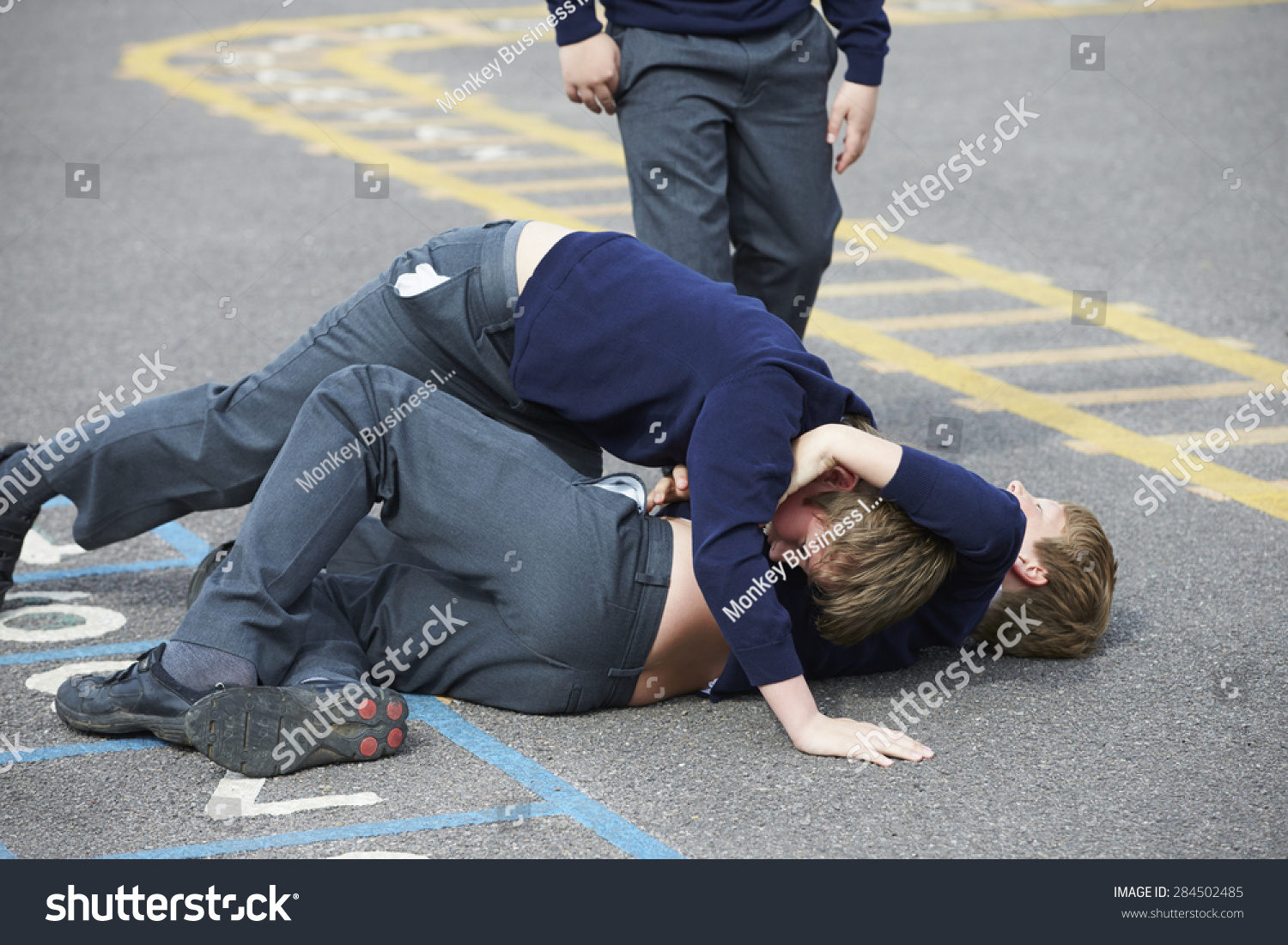 Two Boys Fighting In School Playground Stock Photo 284502485 : Shutterstock