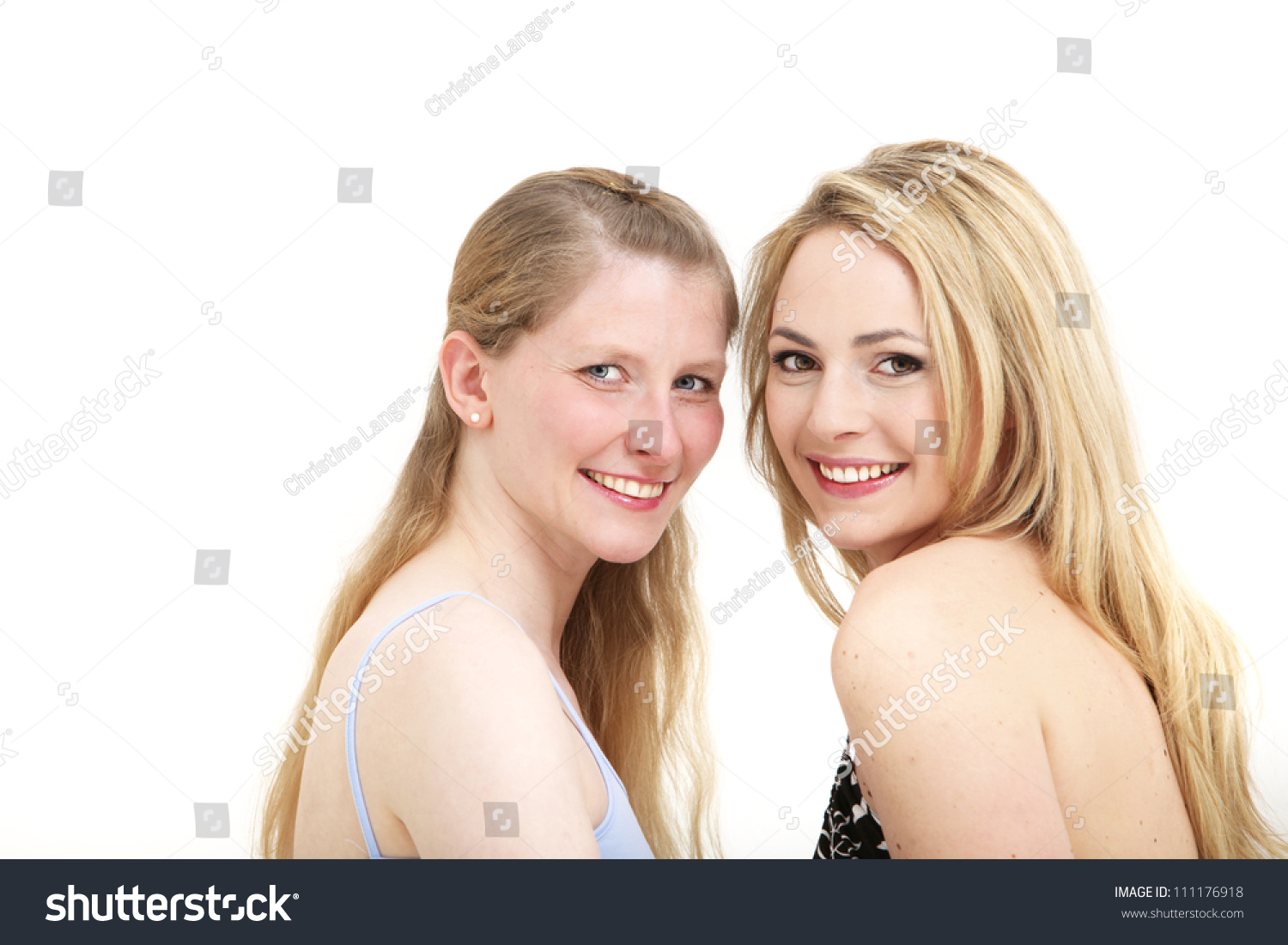 Two Cheerful Outgoing Women Head And Shoulders Studio Portrait Of Two ...