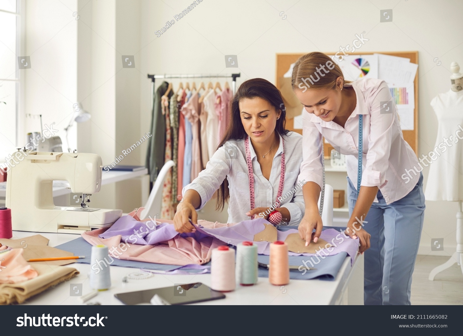 Two professional seamstresses.