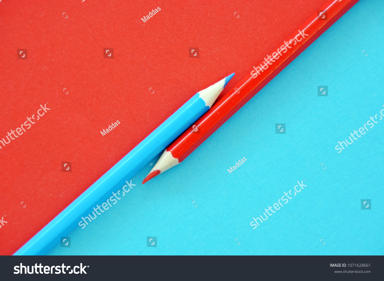 Download Two Colored Pencils Split Picture Half Stock Photo Edit Now 1071628661