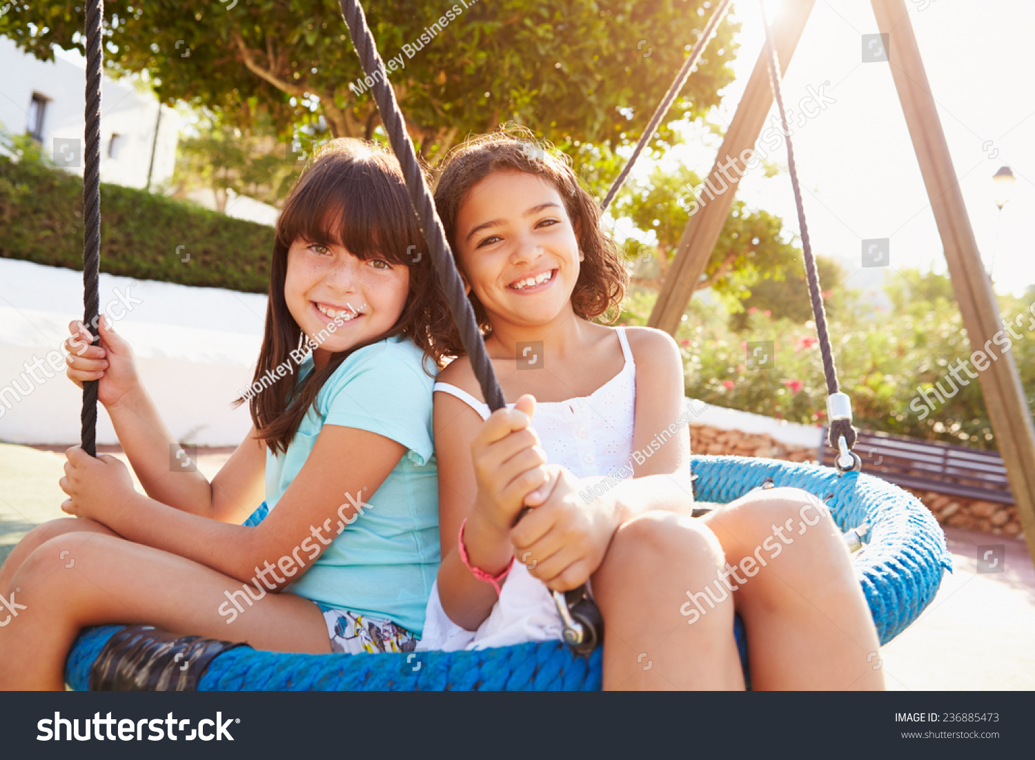 Two Girls Having Fun On Swing Stock Photo 236885473 - Shutterstock